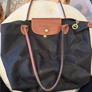 Longchamp Elegant Black Tote with Brown Trim